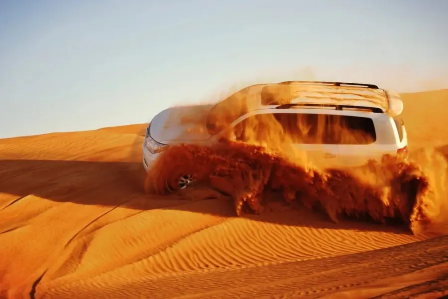 Dubai Desert Safari: Red Dune Bashing, Sandboarding, Camel Riding, Live Entertainment & BBQ Dinner